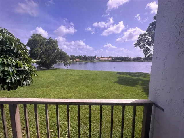 a view of a lake from a yard