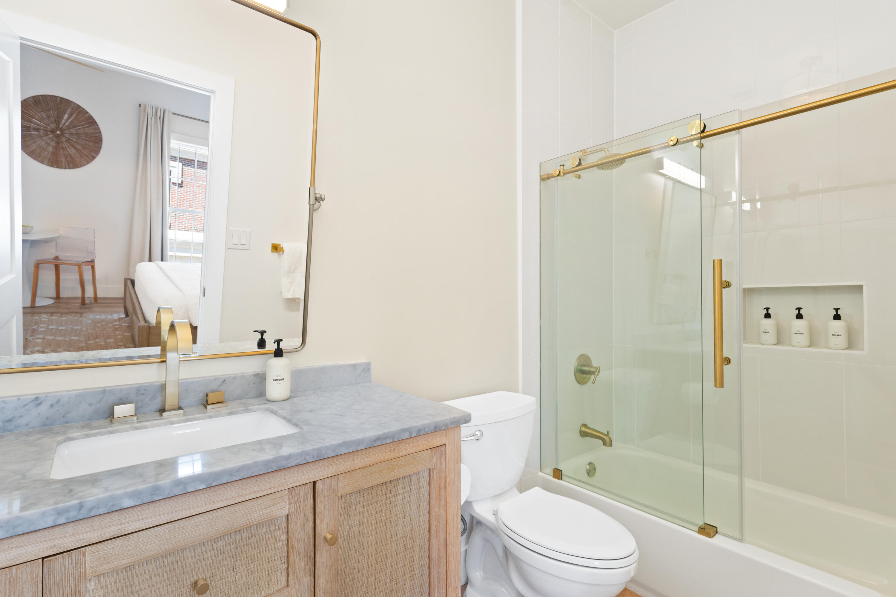 10343 East County Highway 30A, Unit B235 Inlet Beach, FL 32413 - Photo 3 of 3 a bathroom with a granite countertop sink a toilet and shower