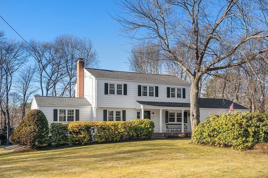 25 Strawberry Hill Road Andover, MA 01810 - Photo 38 of 38 a front view of a house with a garden