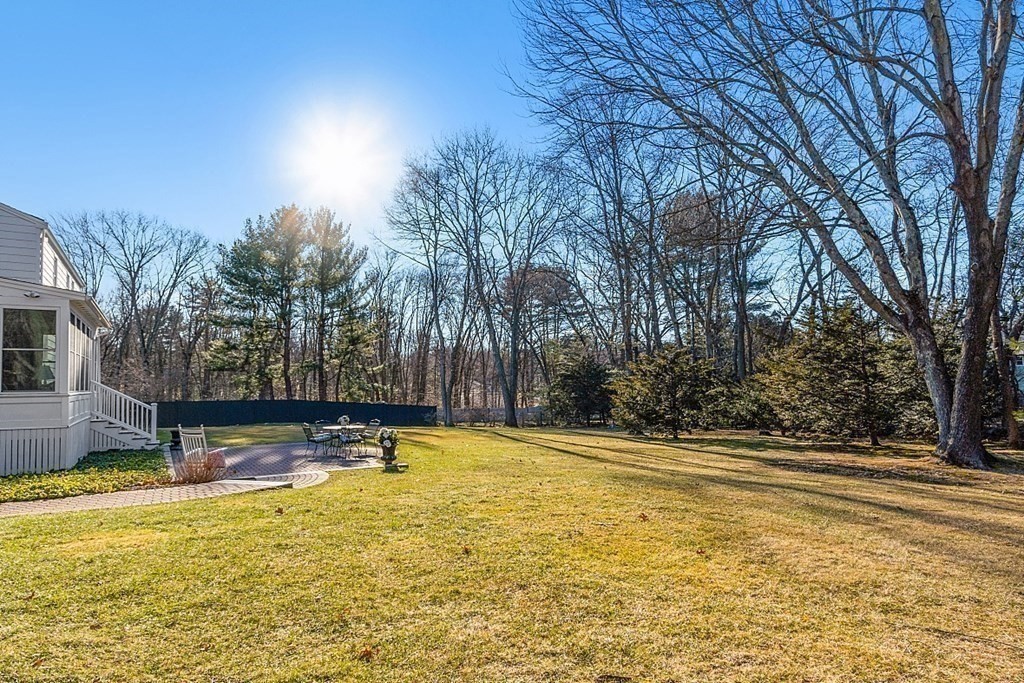 25 Strawberry Hill Road Andover, MA 01810 - Photo 4 of 38 a swimming pool with outdoor seating and yard