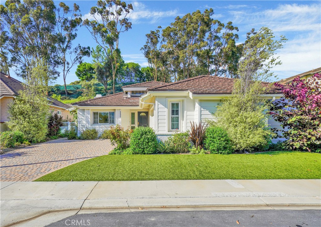 24941 Danamaple Dana Point, CA 92629 - Photo 1 of 32 a front view of a house with a garden