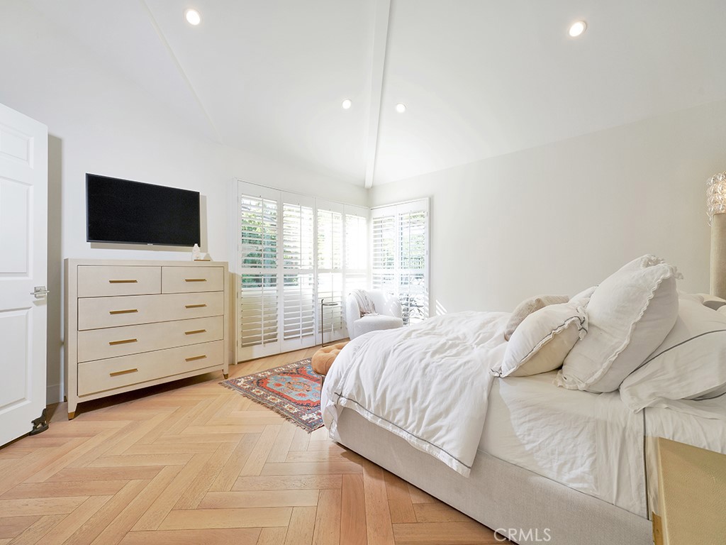 24941 Danamaple Dana Point, CA 92629 - Photo 14 of 32 a bed room with a bed and television