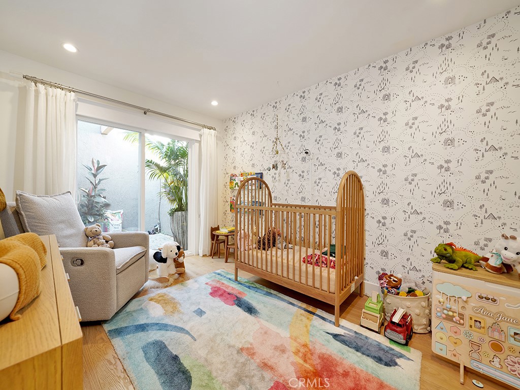 24941 Danamaple Dana Point, CA 92629 - Photo 20 of 32 a bedroom with furniture and a window