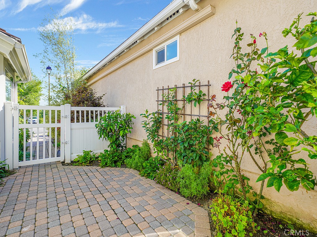 24941 Danamaple Dana Point, CA 92629 - Photo 25 of 32 a flower garden with wooden fence