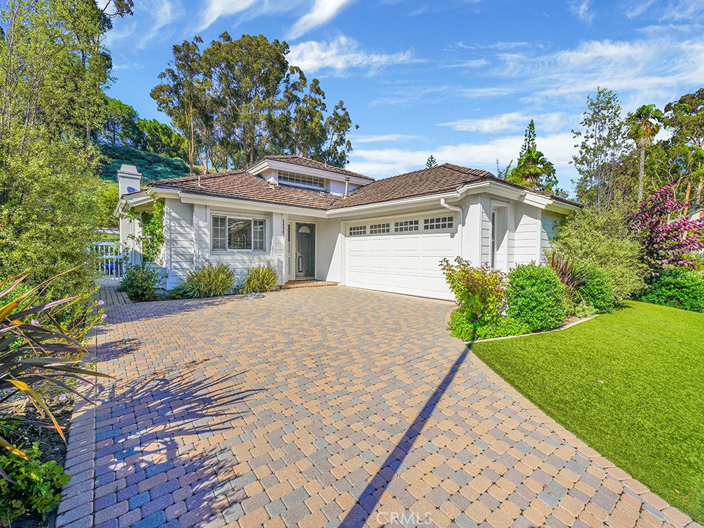 24941 Danamaple Dana Point, CA 92629 - Photo 27 of 32 a front view of a house with a garden