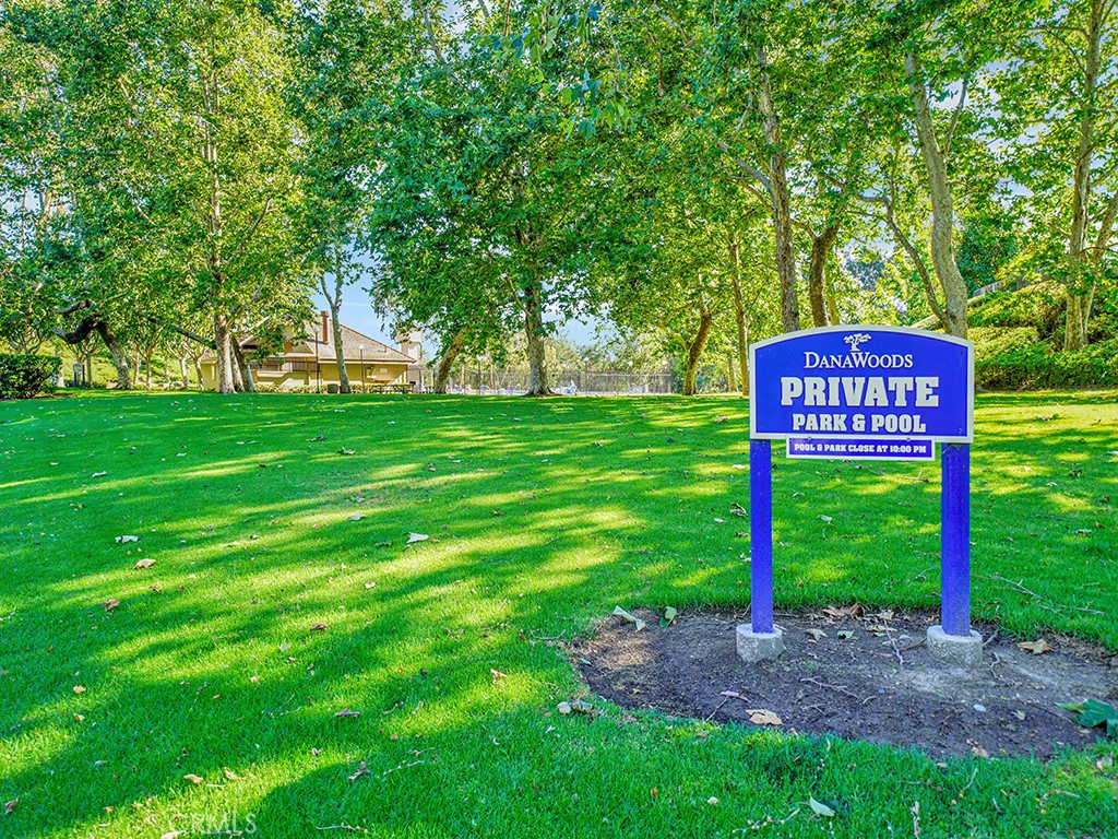 24941 Danamaple Dana Point, CA 92629 - Photo 29 of 32 a sign that is sitting in the grass