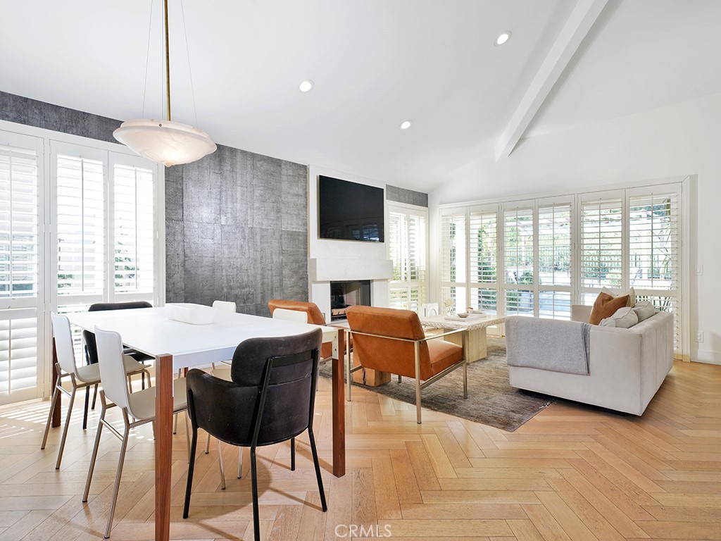 24941 Danamaple Dana Point, CA 92629 - Photo 3 of 32 a living room with fireplace furniture and a large window