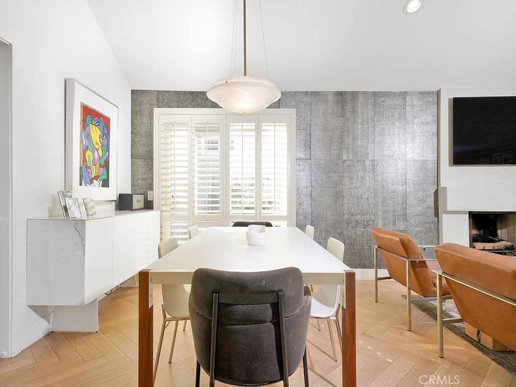 24941 Danamaple Dana Point, CA 92629 - Photo 31 of 32 a dining room with furniture and a flat screen tv