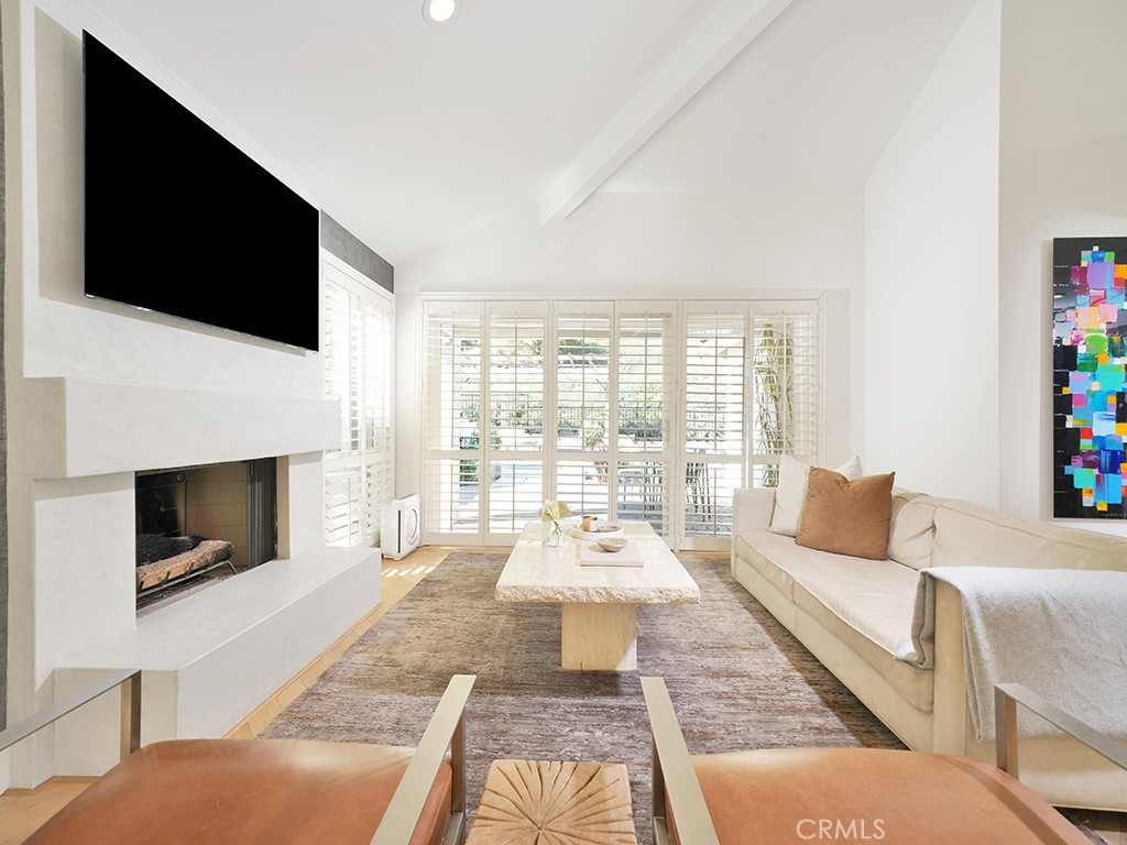 24941 Danamaple Dana Point, CA 92629 - Photo 32 of 32 a living room with fireplace furniture and a flat screen tv