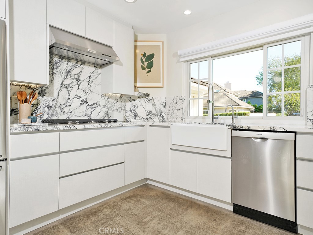 24941 Danamaple Dana Point, CA 92629 - Photo 7 of 32 a bathroom with a sink and a mirror