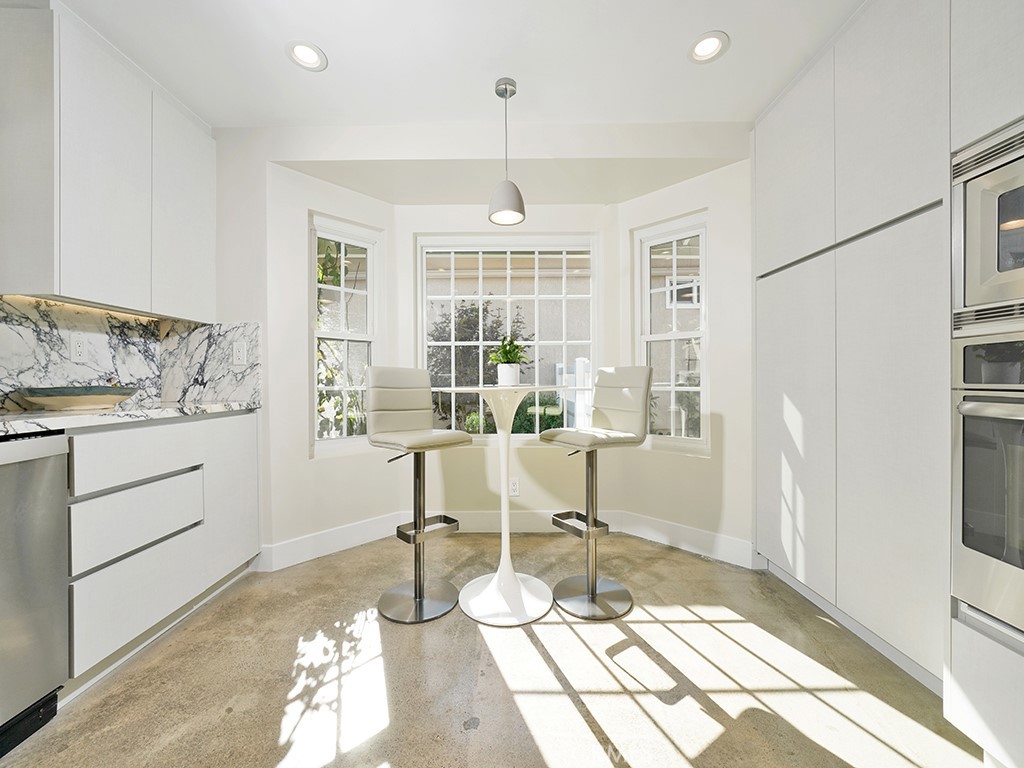 24941 Danamaple Dana Point, CA 92629 - Photo 9 of 32 a workspace with wooden floor and a window