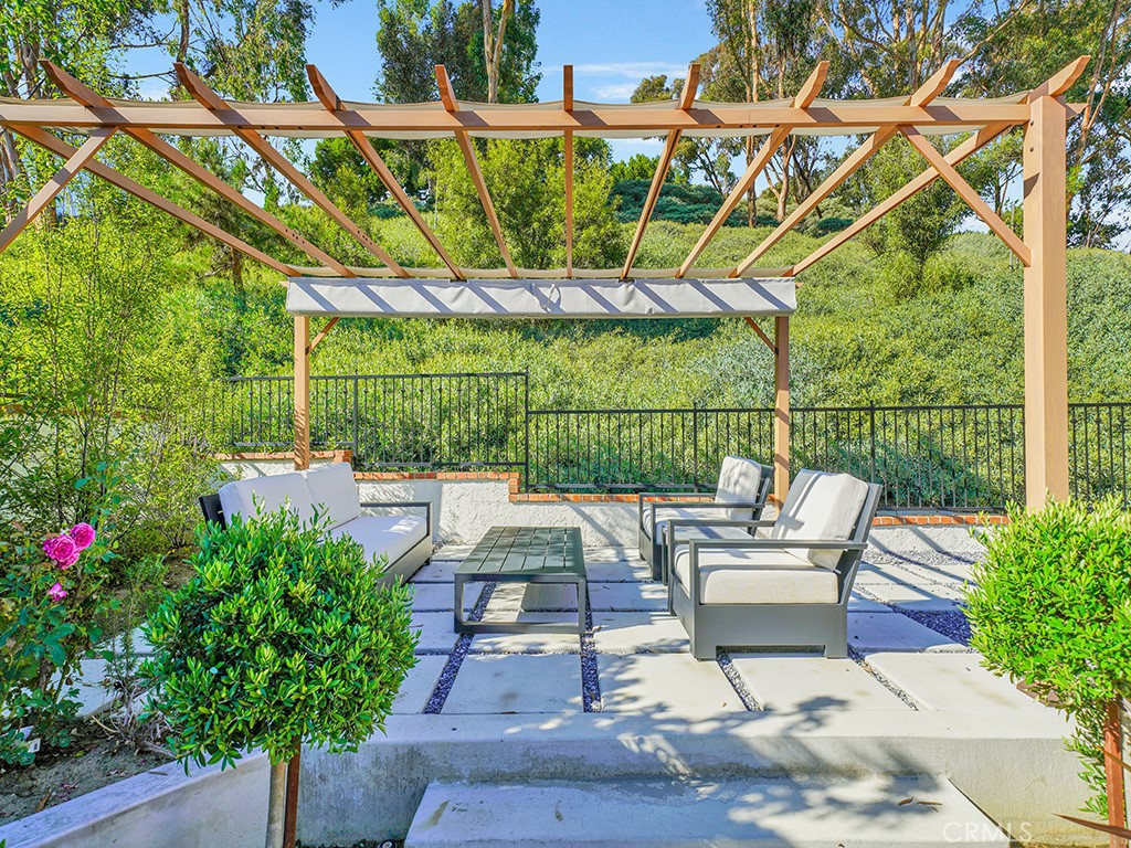 24941 Danamaple Dana Point, CA 92629 - Photo 10 of 32 a view of a chairs and table in backyard of the house