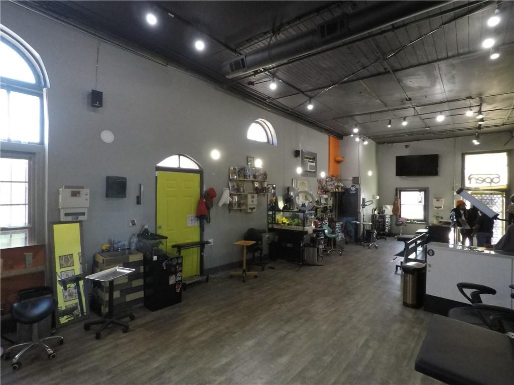 251 Trinity Avenue Southwest Atlanta, GA 30303 - Photo 24 of 32 a view of a room with gym equipment and a large window