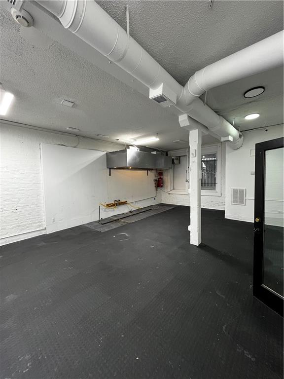 251 Trinity Avenue Southwest Atlanta, GA 30303 - Photo 25 of 32 a view of empty room with wooden floor