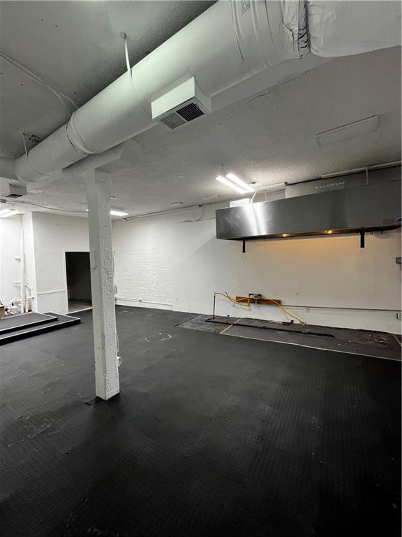 251 Trinity Avenue Southwest Atlanta, GA 30303 - Photo 27 of 32 a view of a room with gym equipment