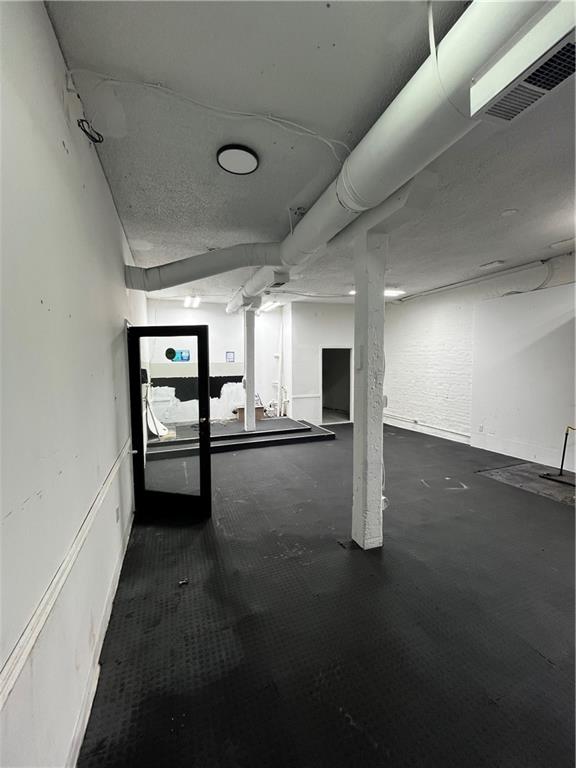 251 Trinity Avenue Southwest Atlanta, GA 30303 - Photo 28 of 32 a view of a room with gym equipment