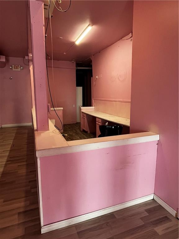 251 Trinity Avenue Southwest Atlanta, GA 30303 - Photo 30 of 32 a view of washer and dryer with wooden floor