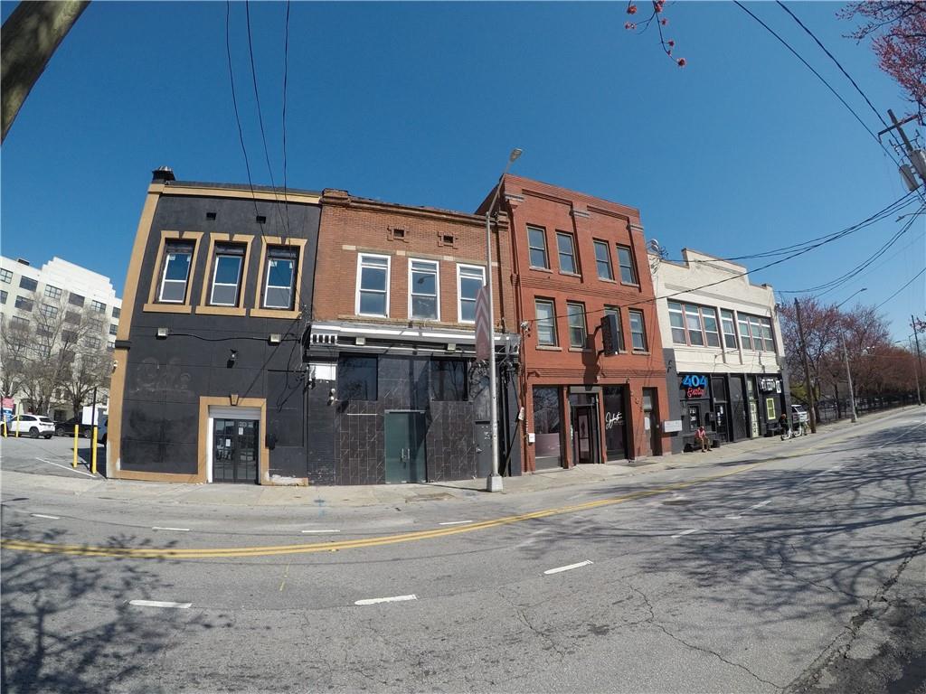 251 Trinity Avenue Southwest Atlanta, GA 30303 - Photo 3 of 32 a front view of a building with a lots of windows