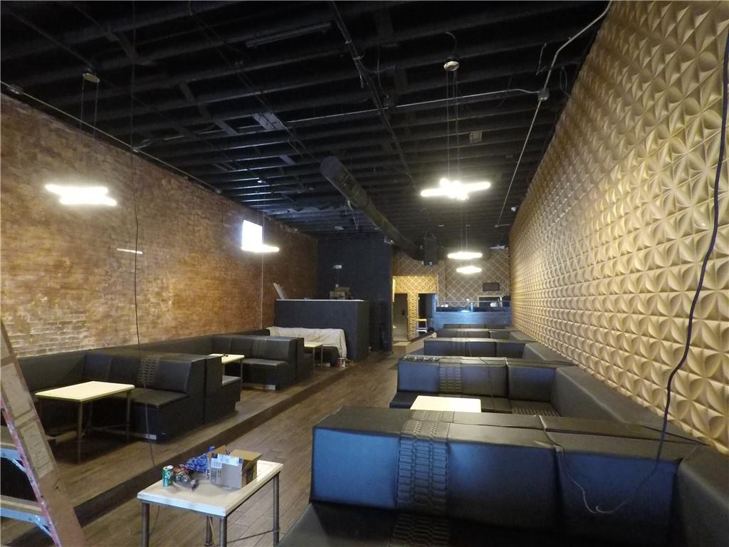 251 Trinity Avenue Southwest Atlanta, GA 30303 - Photo 5 of 32 a kitchen with kitchen island granite countertop lots of counter top space