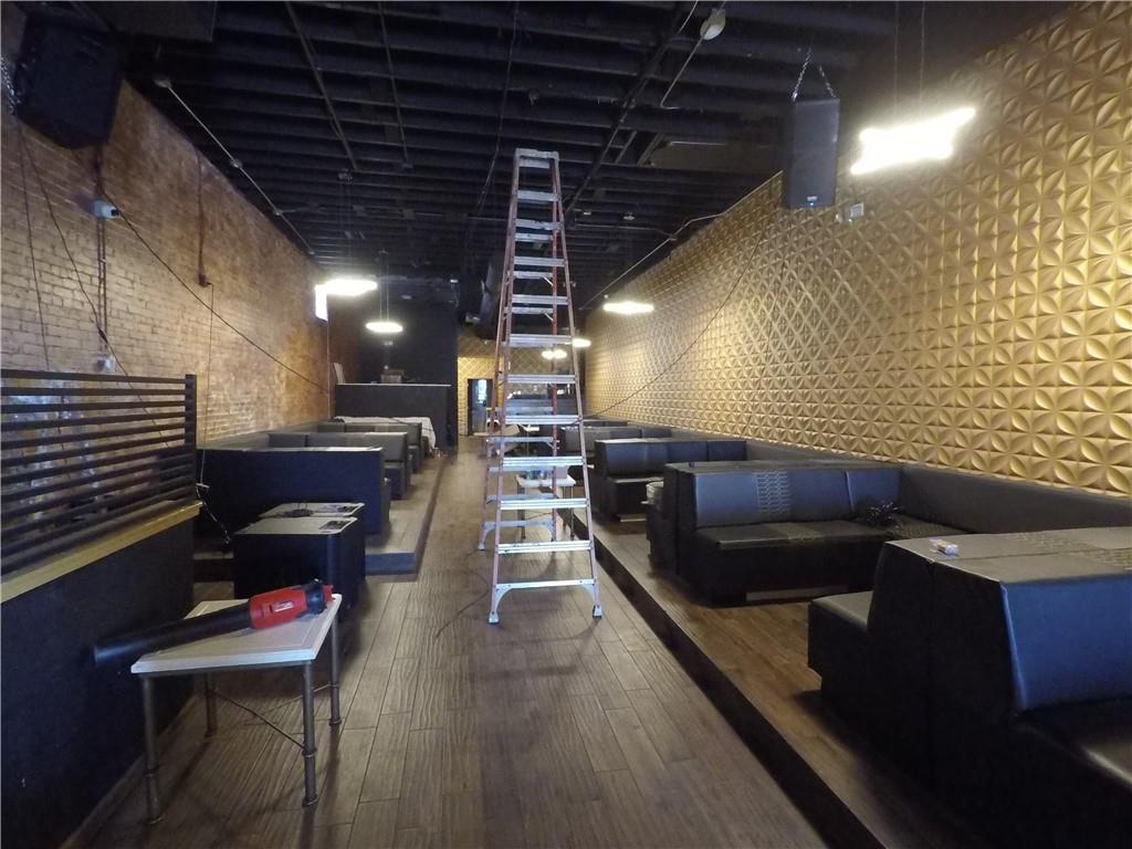 251 Trinity Avenue Southwest Atlanta, GA 30303 - Photo 6 of 32 a lobby with furniture and stairs