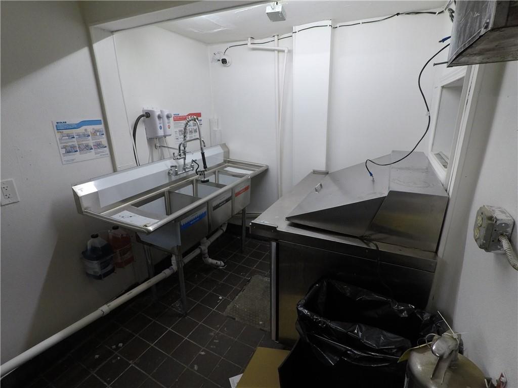 251 Trinity Avenue Southwest Atlanta, GA 30303 - Photo 9 of 32 a bathroom with a sink a toilet and shower