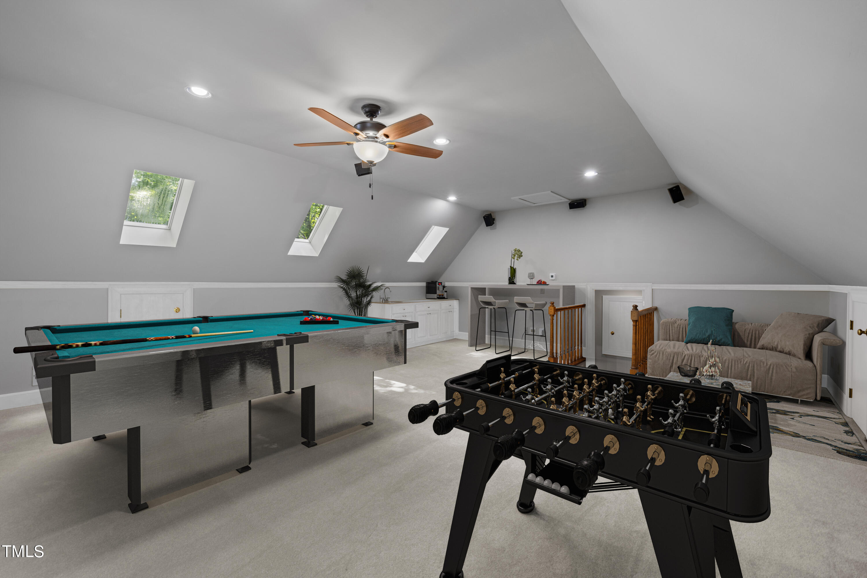 8413 Bournemouth Drive Raleigh, NC 27615 - Photo 46 of 94 a living room with furniture a rug and a chandelier