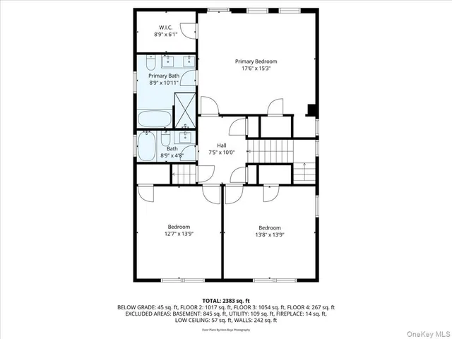 a picture of a bench in front of a wall