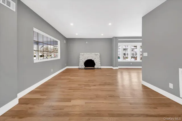 a room with window and a wooden floor