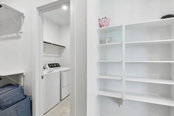 a view of room with cabinets