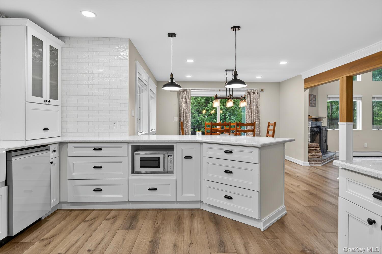 123 Elizabeth Way Ridge, NY 11961 - Photo 1 of 1 a view of kitchen with wooden floor