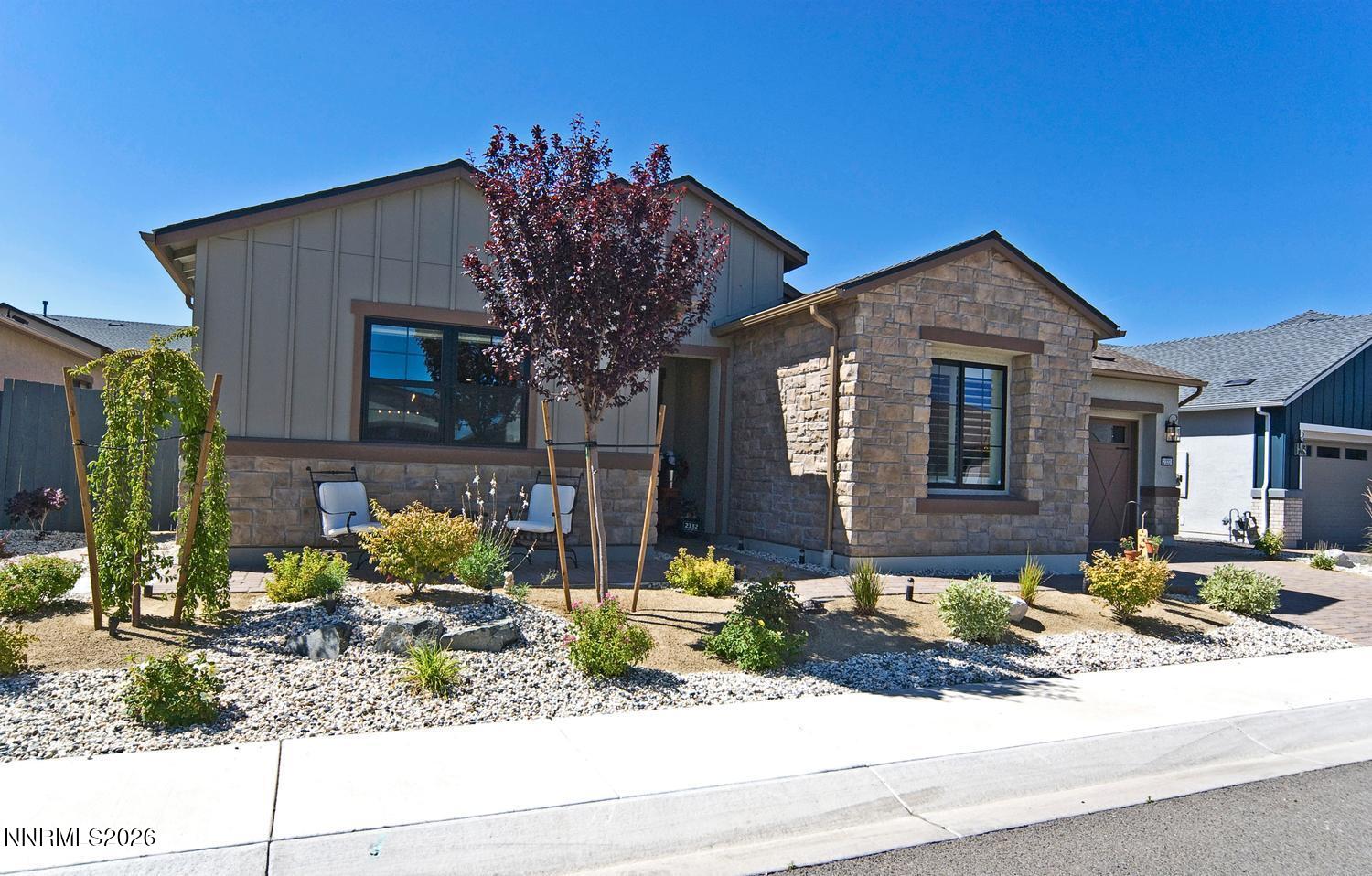 2332 Hammer Falls Drive Reno, NV 89521 - Photo 3 of 57 a front view of a house