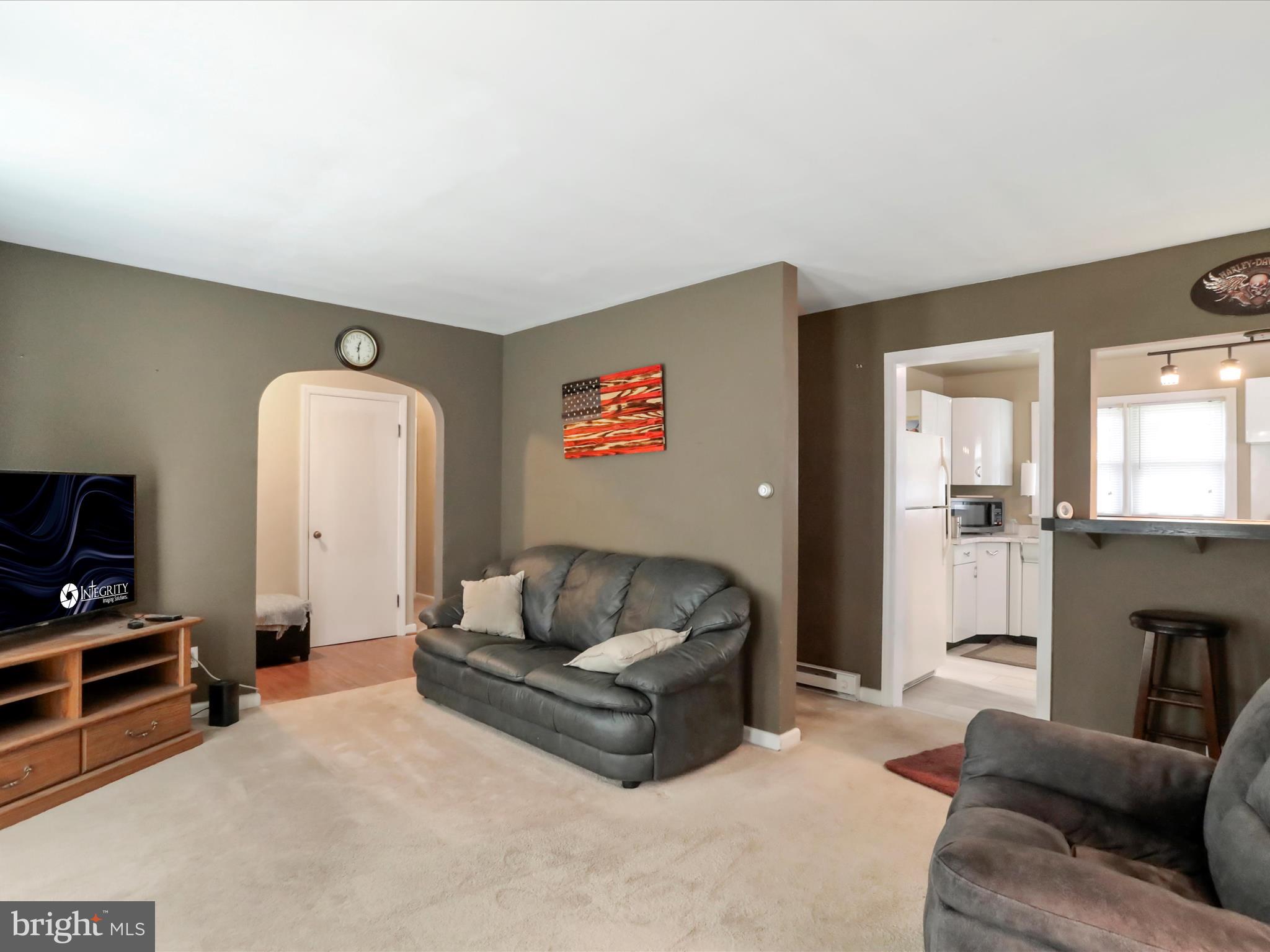 13517 Paradise Church Road Hagerstown, MD 21742 - Photo 16 of 38 a living room with furniture and a flat screen tv