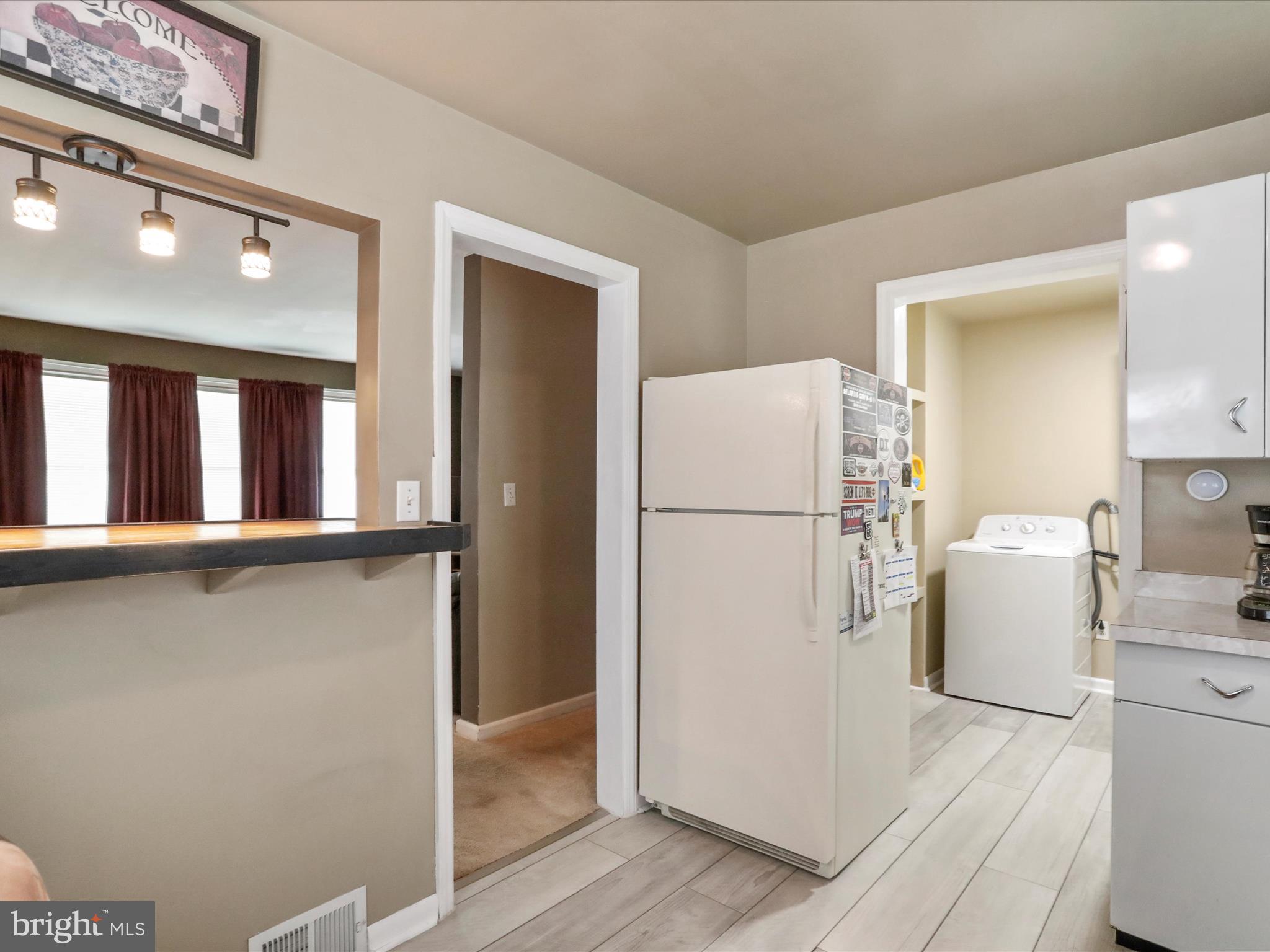 13517 Paradise Church Road Hagerstown, MD 21742 - Photo 20 of 38 a refrigerator freezer sitting inside of a kitchen