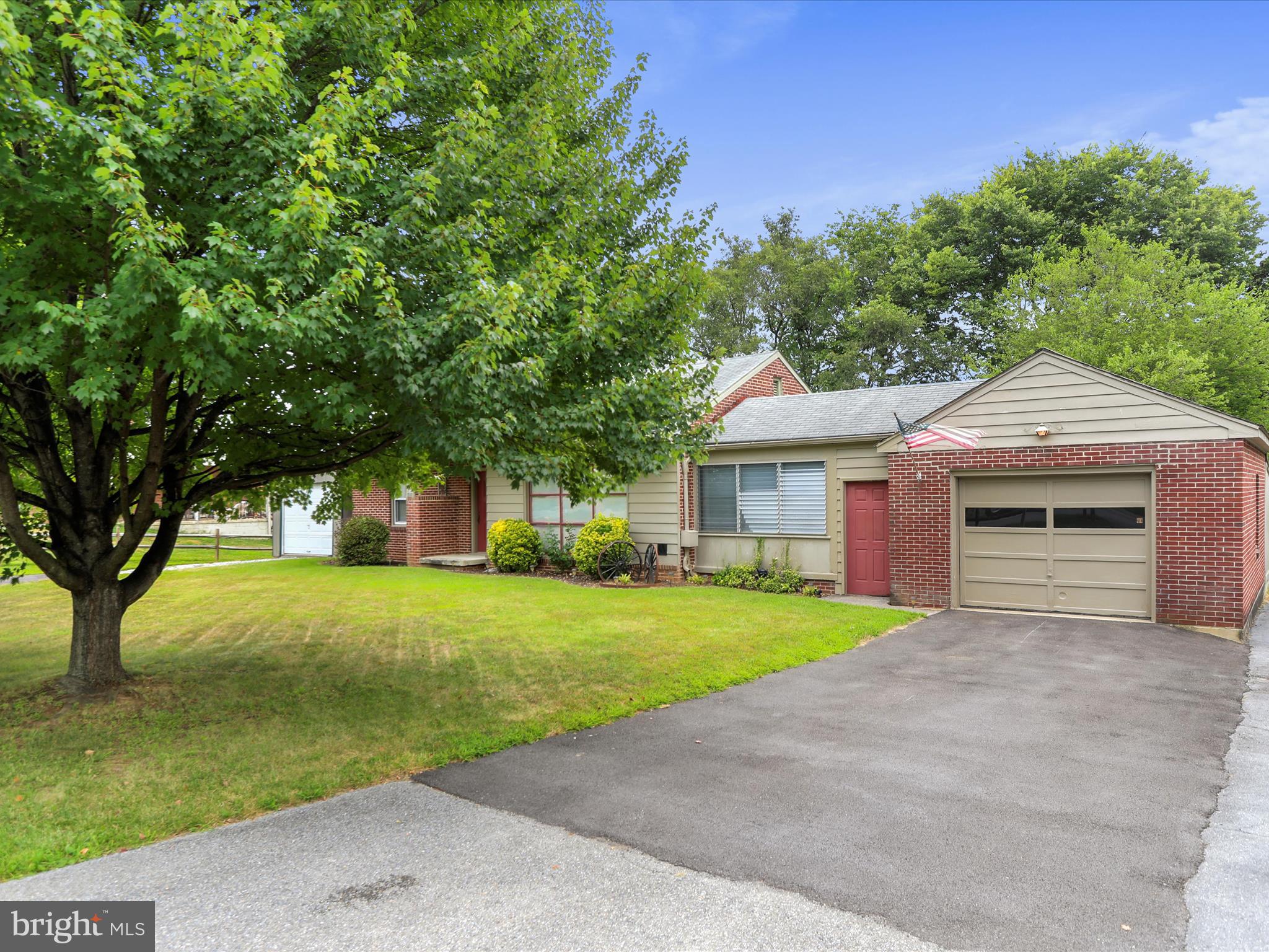 13517 Paradise Church Road Hagerstown, MD 21742 - Photo 2 of 38 a front view of a house with a yard and trees