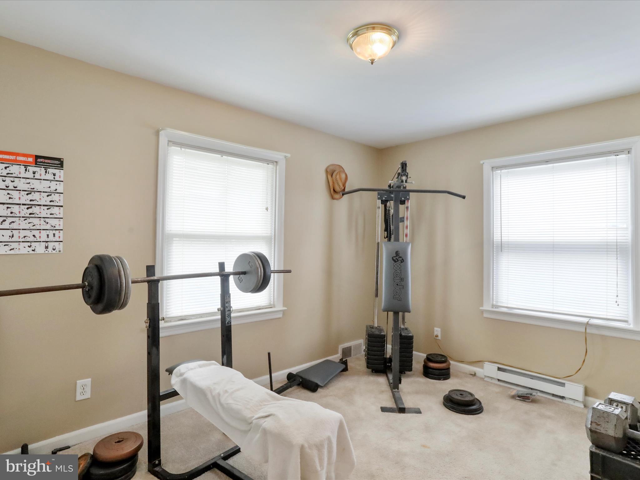 13517 Paradise Church Road Hagerstown, MD 21742 - Photo 6 of 38 a bathroom with a sink and a mirror