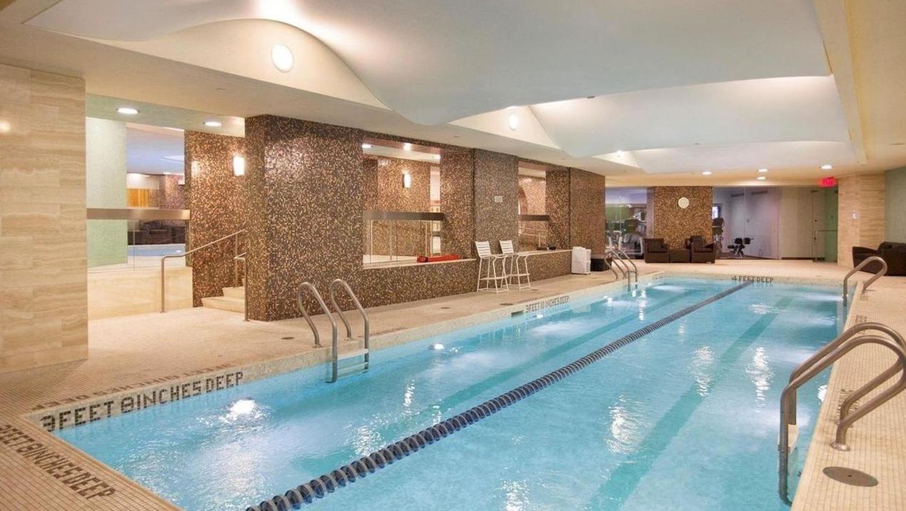 240 Riverside Boulevard, Unit SUITE1 Manhattan, NY 10069 - Photo 23 of 33 a view of a lobby with black carpet