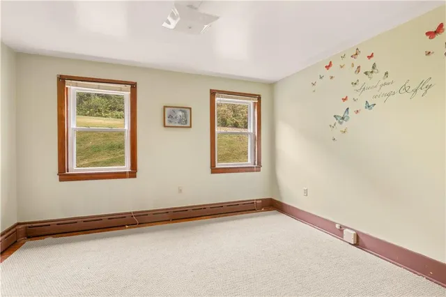 a view of an empty room and window