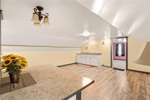 a view of a hallway with staircase