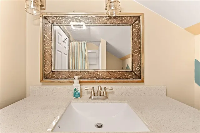 a view of a hallway with wooden walls and stairs