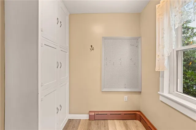 a view of a door and a window in the house