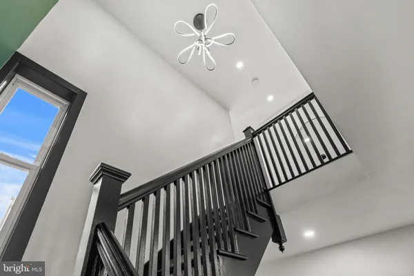 a view of a hallway with staircase