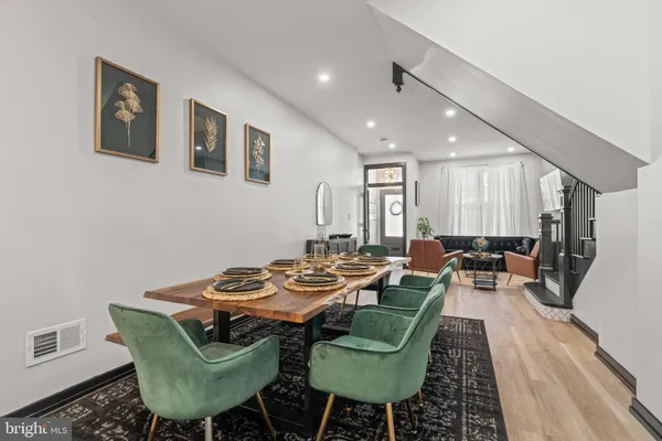 a living room with furniture and a table