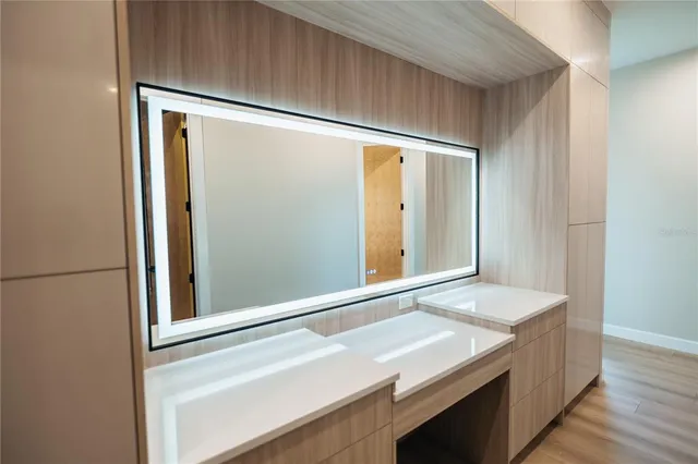 a kitchen with a refrigerator and countertop