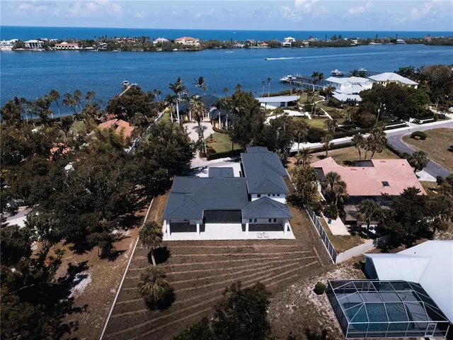 an aerial view of house with yard