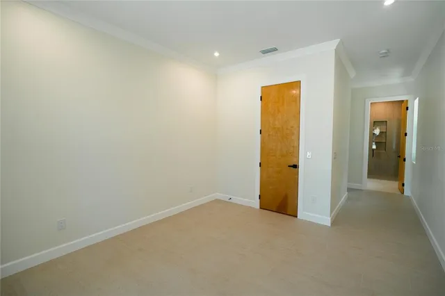 a bathroom with a double vanity sink toilet mirror and shower