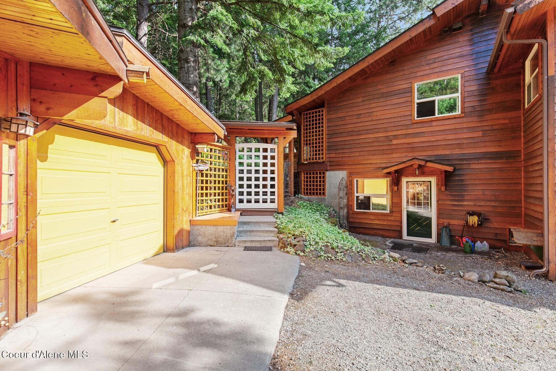 8562 South Gozzer Road Harrison, ID 83833 - Photo 28 of 40 Backdoor to Single car Garage