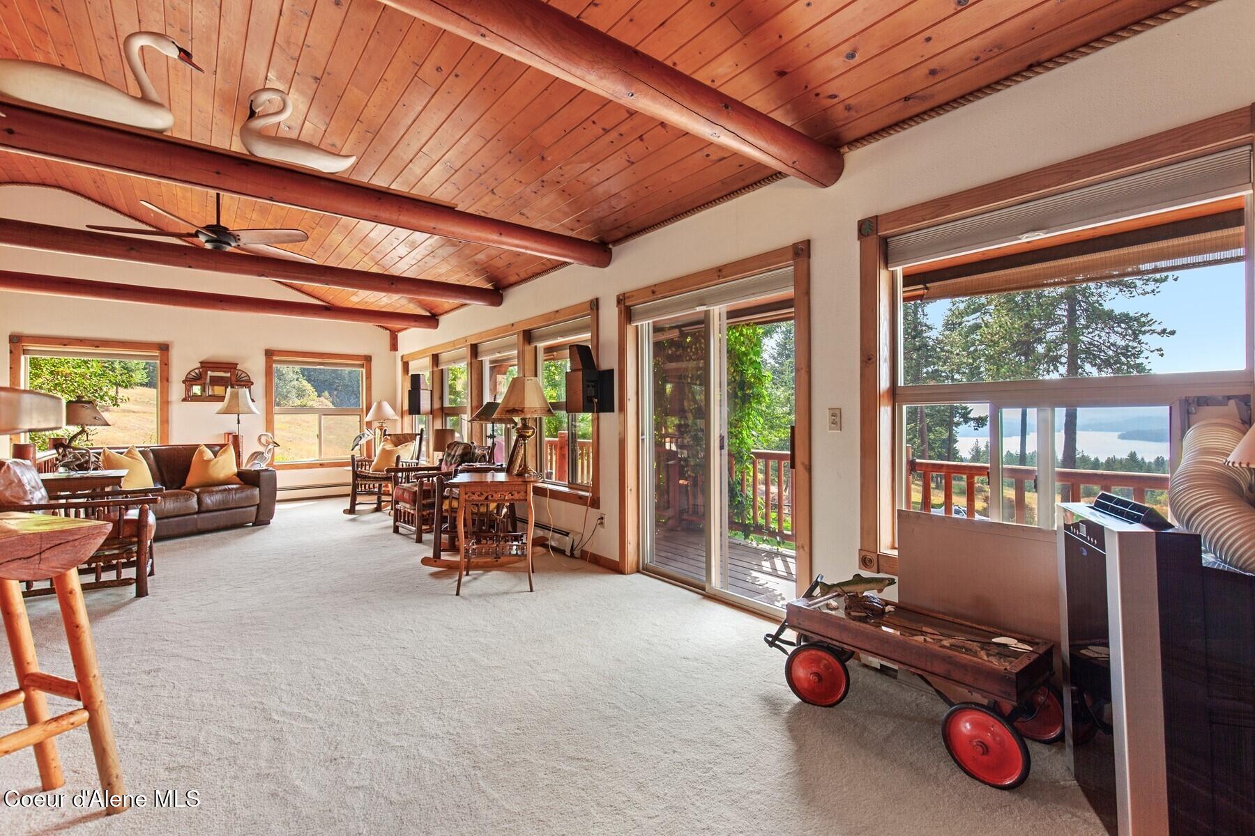 8562 South Gozzer Road Harrison, ID 83833 - Photo 8 of 40 Slider to Deck with Lake Views