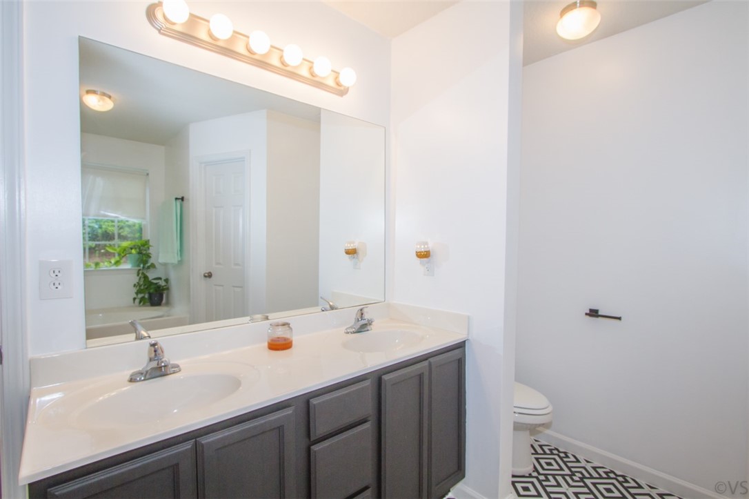 121 Duraleigh Road Anderson, SC 29621 - Photo 34 of 40 Master bathroom which boasts double sinks and chec