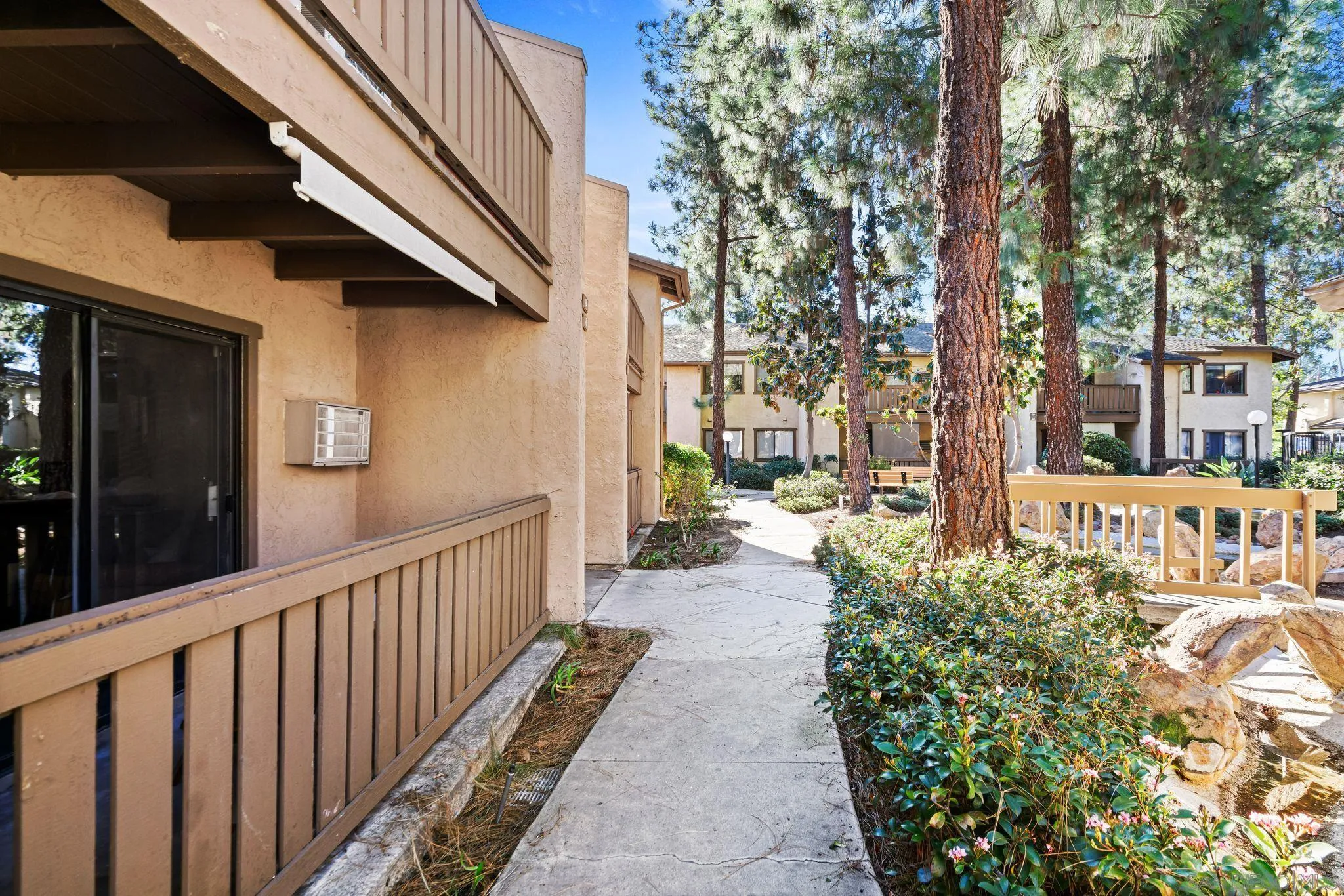 10226 Black Mountain Road, Unit 83 San Diego, CA 92126 - Photo 18 of 23 a view of a house with a street view