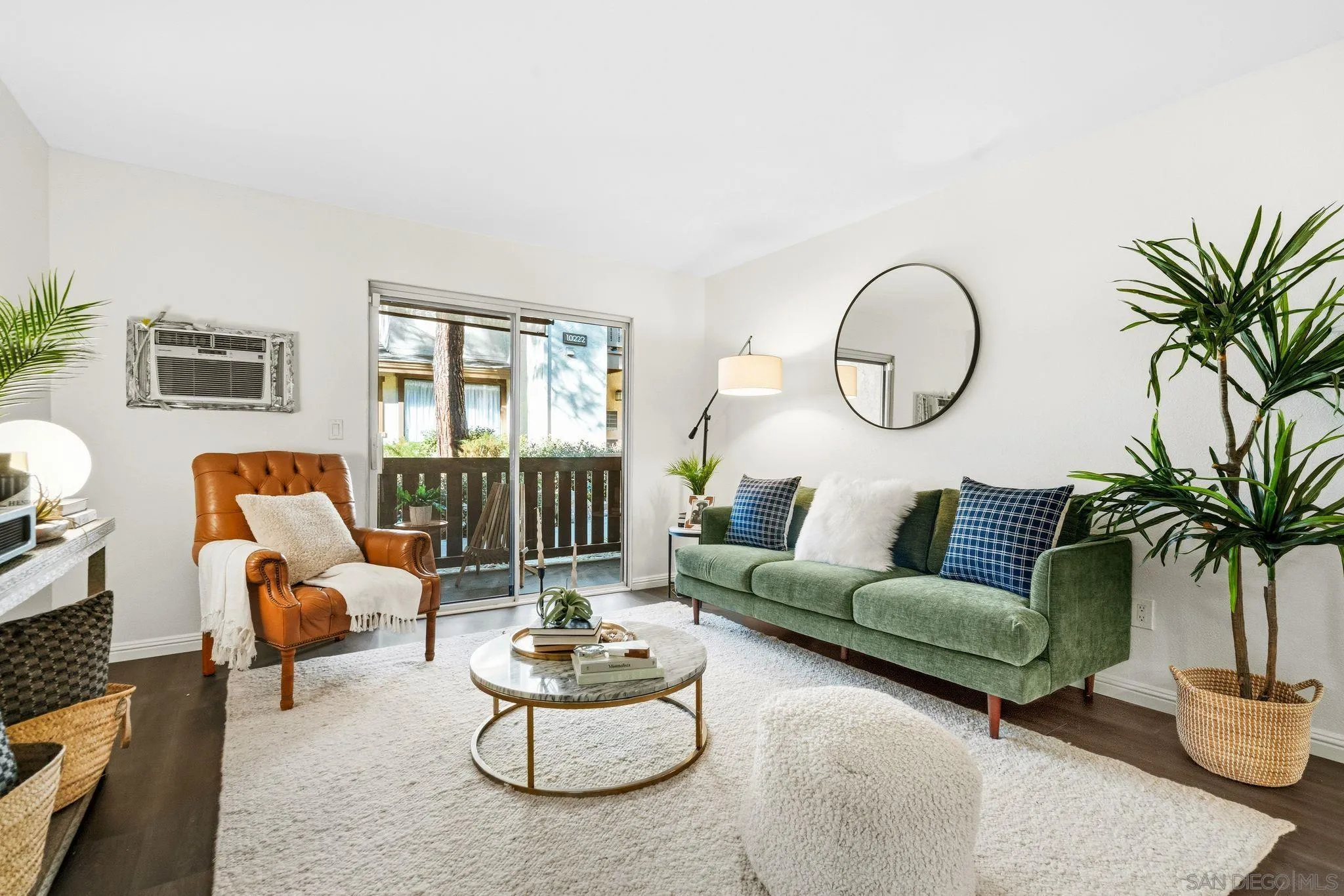 10226 Black Mountain Road, Unit 83 San Diego, CA 92126 - Photo 2 of 23 a living room with furniture and a large window
